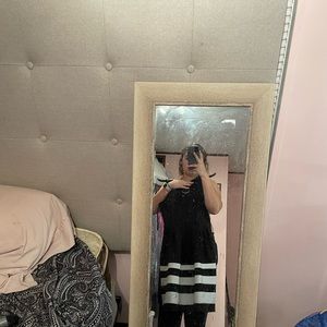 black and white pencil dress with flare on end